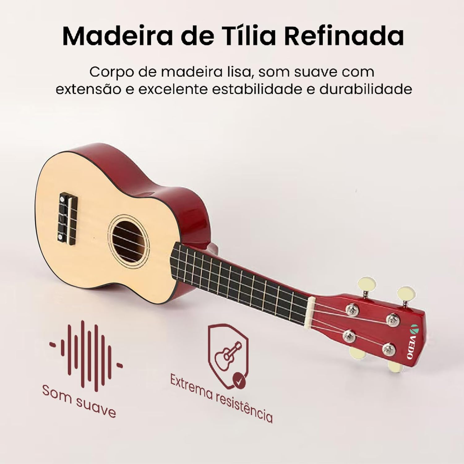 Ukulele VEDO UK10 em madeira refinada de tília com acabamento liso e corpo claro com laterais e traseira vermelha. Texto destaca som suave, excelente estabilidade, durabilidade e extrema resistência.
